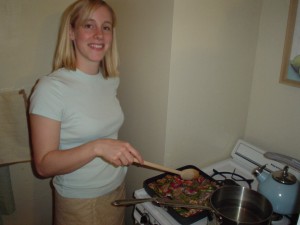 With some electric stoves this would definitely be too close. But this lady cooks on gas!